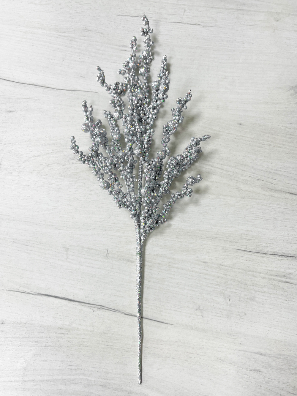 Изображение товара Ветка из ягодок серебро 50 см