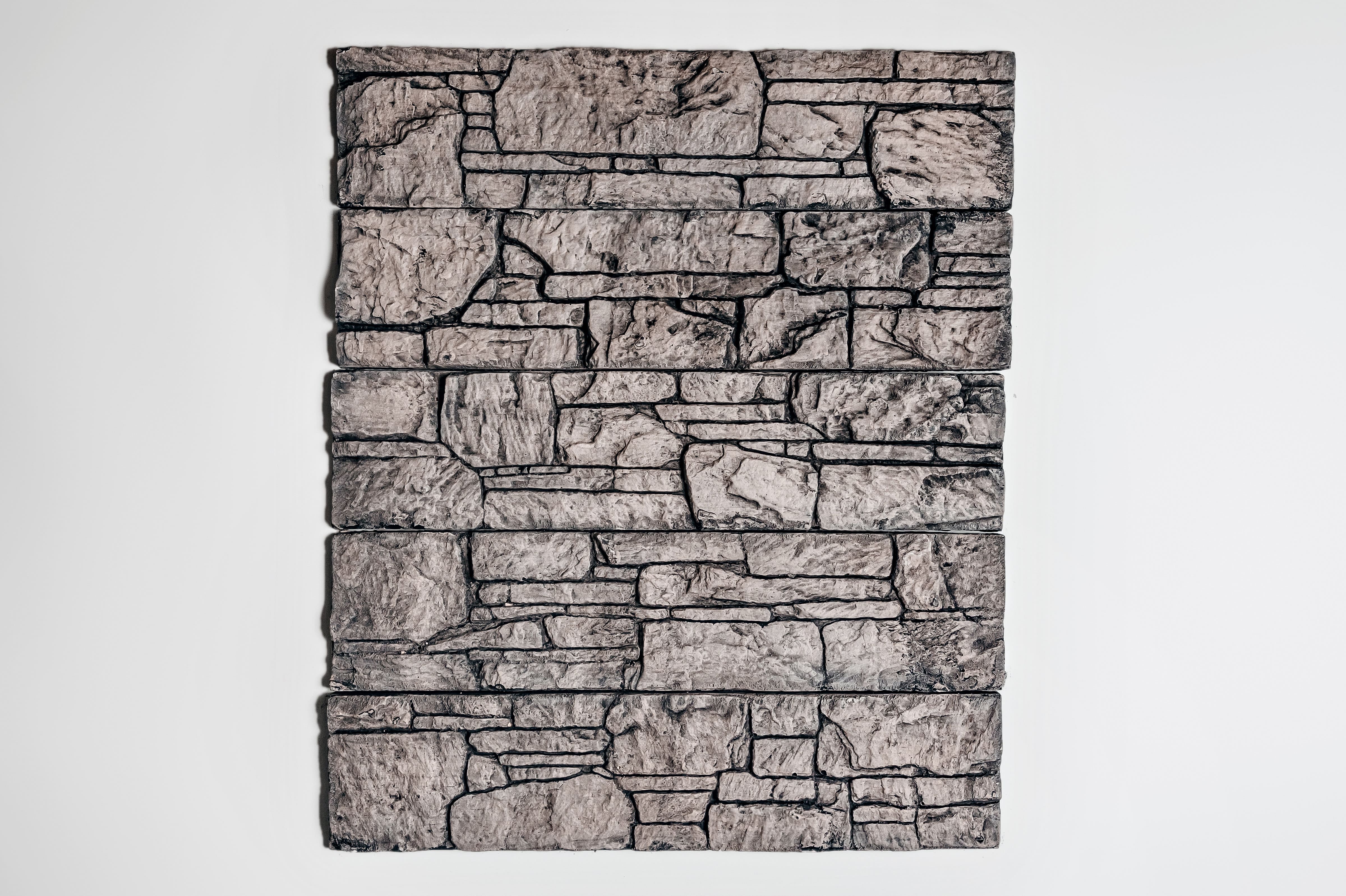 Изображение товара Гипсельная плитка Евролит Аппалачи 40х10 см имитация камень черно-коричневый